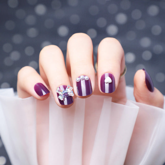 Wearing Nails With Diamonds And Purple Fake Nails-1