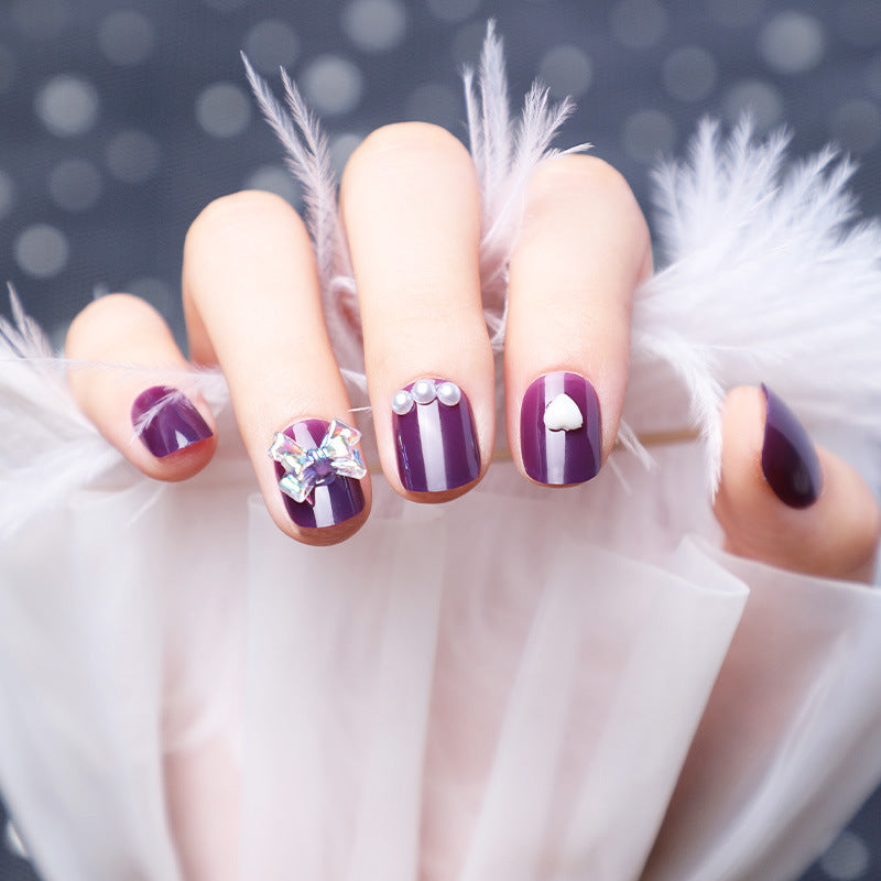 Wearing Nails With Diamonds And Purple Fake Nails-0