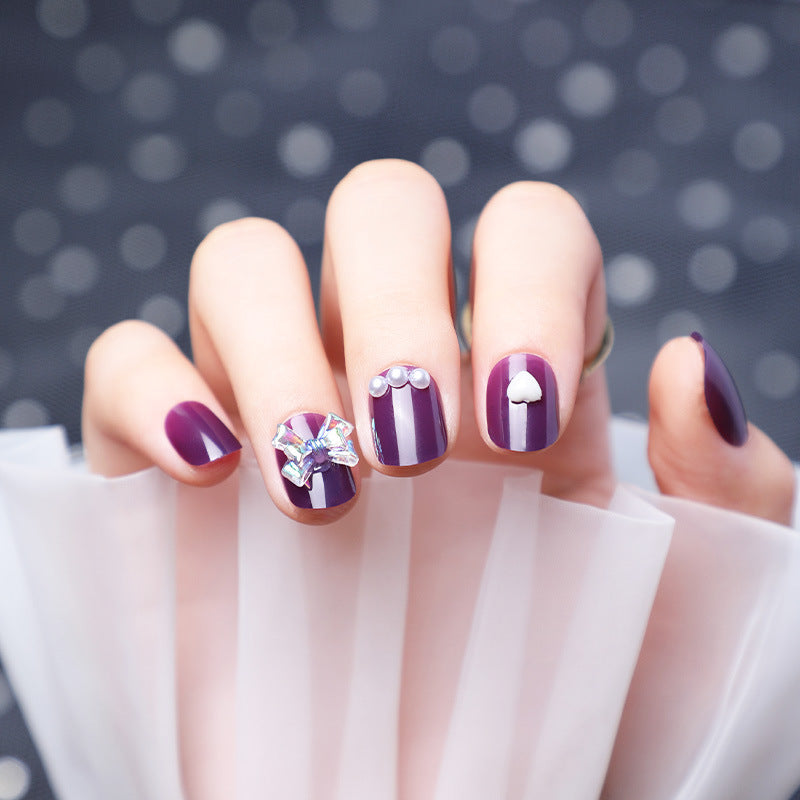 Wearing Nails With Diamonds And Purple Fake Nails-1