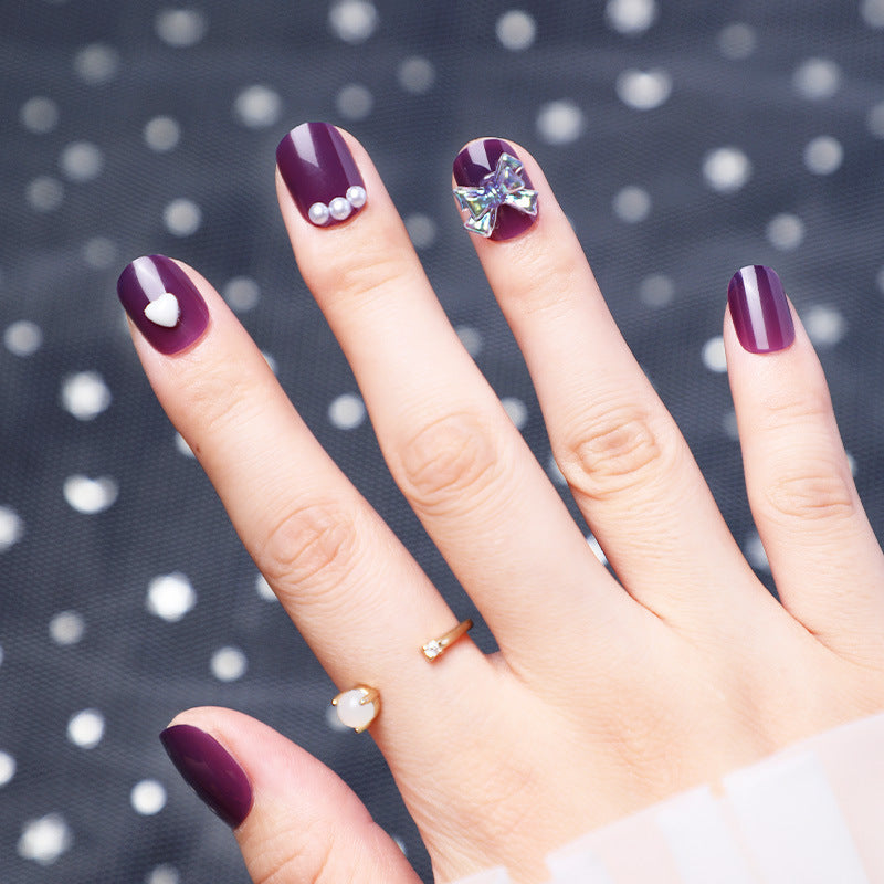 Wearing Nails With Diamonds And Purple Fake Nails-4
